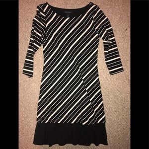 Black/white striped dress with ruffle at bottom